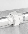 Five Pack 304 Stainless Steel Union Fittings One Quarter Inch NPT Male To One Quarter Inch NPT Female Cast Pipe Connectors installed.