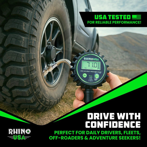 Close-up of Rhino USA digital tire pressure gauge with inflator, 2-inch dial and stainless braided hose connected to a vehicle tire.