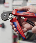 Person using self-adjusting crimping pliers for end sleeves and ferrules, hexagonal crimp for confined spaces up to 10 mm2