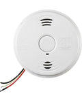 Top view of a Dual Hazard Smoke And Carbon Monoxide Detector With Voice Warning Hardwired Setup And Ten Year Sealed Lithium Battery Backup Interconnectable Network Built Tough For Zero Drama Family Safety White.