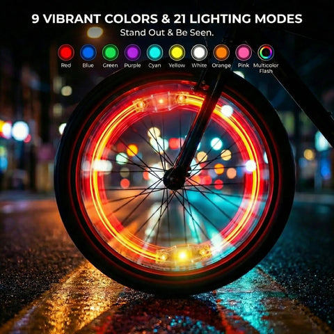 Bicycle wheel with Rechargeable 9 Color LED Bicycle Spoke Lights With 21 Modes And Motion Sensor Auto On Off lit in multi-color at night