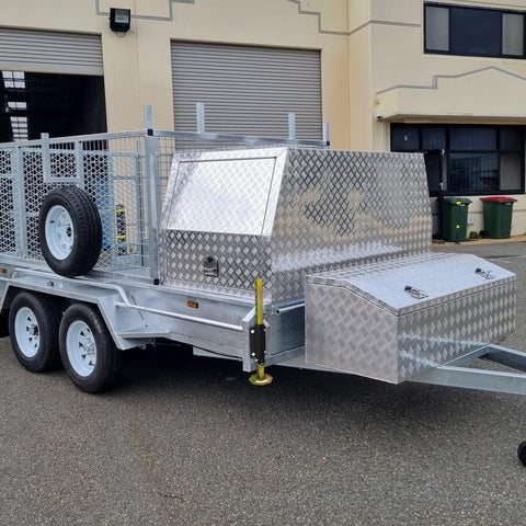 Keep Your Rig Rock Solid With Boss Grade Telescoping Stabilizer Jacks 2500 Lb Capacity Adjusts Two To Eighteen Inches Fits Farm Utility Horse And Car Haulers Includes Durable Screw Or Weld Mount Kit on a trailer with toolbox and spare tire.