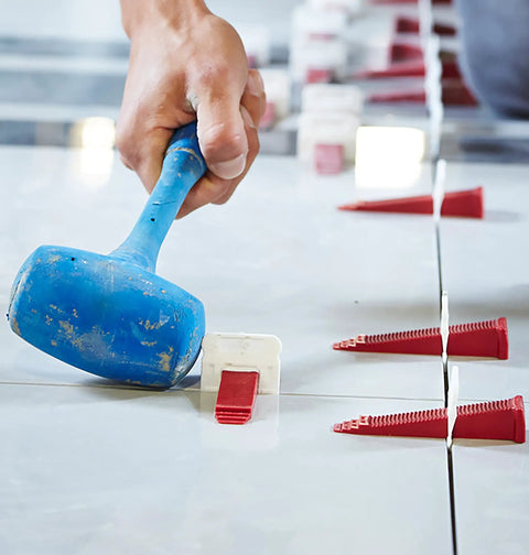 Installation using Perfect Level Master Anti Lippage Tile Leveling System Kit With 500 Self Leveling Clips on ceramic tiles.
