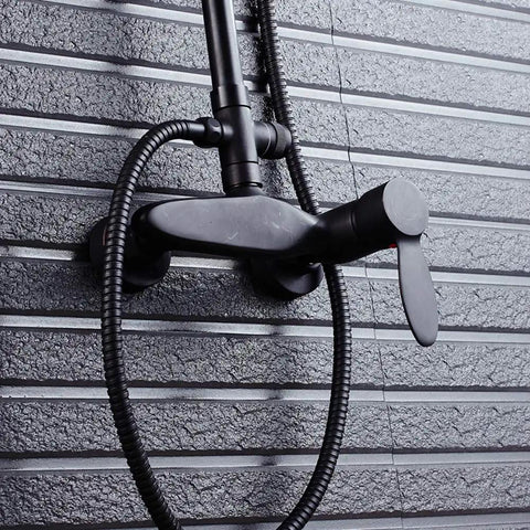 UMJIGF Shower System with Hot and Cold Water Black Shower Faucet Set multifunction handle and hose mounted on wall.