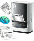 Portable Bluetooth Label Printer With Tape For No Sweat Home Organization Seamless Mobile App Sync Smooth Vanilla Finish showing printed labels and printer.