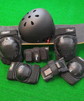 All Ages Skating Protective Gear Set With Helmet Knee Pads Elbow Pads And Wrist Guards For Skateboard Inline And Roller Skating And Scooter Use Durable EVA Padding And Adjustable Fit For Beginners To Pros displayed on a skateboard
