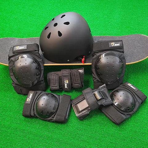 All Ages Skating Protective Gear Set With Helmet Knee Pads Elbow Pads And Wrist Guards For Skateboard Inline And Roller Skating And Scooter Use Durable EVA Padding And Adjustable Fit For Beginners To Pros displayed on a skateboard