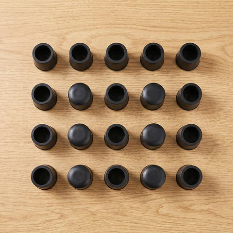 Non Slip Rubber Feet Caps For Ironing Board, 20 Pcs Replacement Leg Tips Covers, black caps arranged on wooden surface