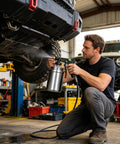 Man using Top Tier Truck Undercoating Spray Guns Offer Heavy Duty Auto Body Sprayer Gear For Metal Rims And Frame With Smart Adjust Flow Nozzles.