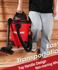 Person carrying Heavy Duty 6 Gallon Wet Dry Vacuum With 3.0 Peak HP, 3 In 1 Function, Dual Flex Hose on wooden staircase