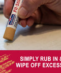 Light Golden Oak Wood Repair Wax Putty Stick For Scratches And Gouges applied to a surface for easy scratch repair, smooth finish.