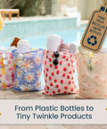 Colorful recycled water bottle bags by the pool with sunglasses and towels, featuring floral and fruit patterns.