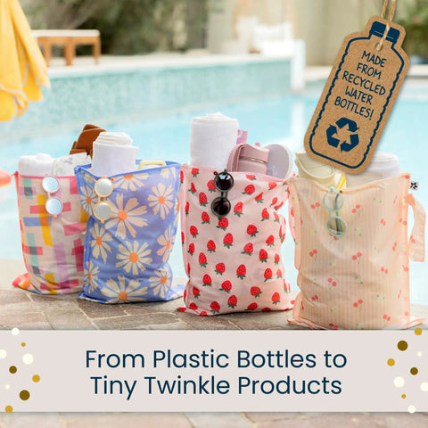 Colorful recycled water bottle bags by the pool with sunglasses and towels, featuring floral and fruit patterns.