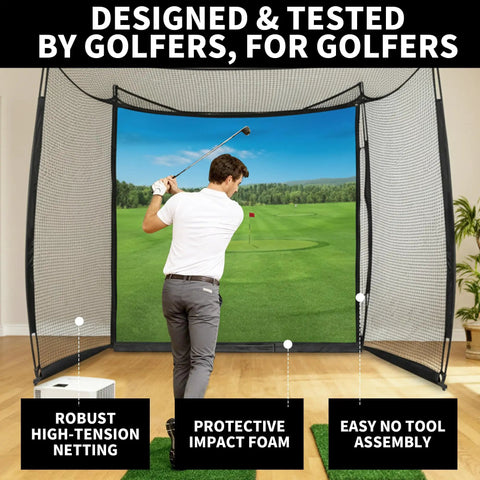 Golfer using Golf Net And Impact Screen Enclosure For Home Simulator, 11x8 ft hitting cage with green target cloth, indoor setup.