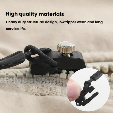 Close-up of Zipper Repair Kit With 3 Different Sizes Replacement Zipper Heads And Quick Install Detachable Pulls on fabric