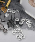 Six Hundred Pieces Foam Board Fasteners With One And One Eighth Inch Galvanized Metal Washers scattered on netting