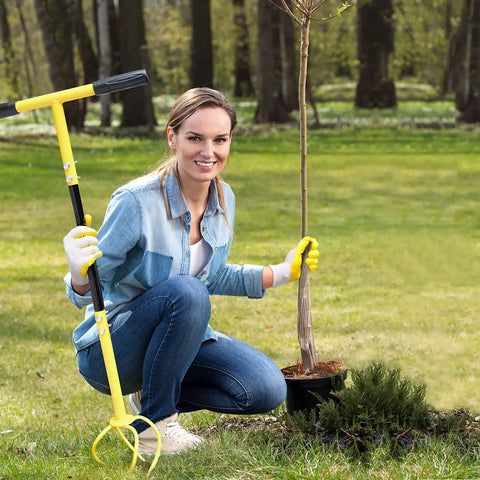 Woman gardening with Manual Twist Tiller For Gardening With Seventeen Inch Arc Handle And Ergonomic Grip in a lawn.