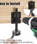 Close-up of 8 Pack Heavy Duty Adjustable Feet Levelers For Furniture 4.7 Inch with drill and wrench installation on table.