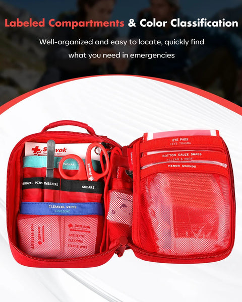Front view of red Senvok 121-piece first aid kit opened to show organized pockets with scissors, tweezers, wipes and bandages.