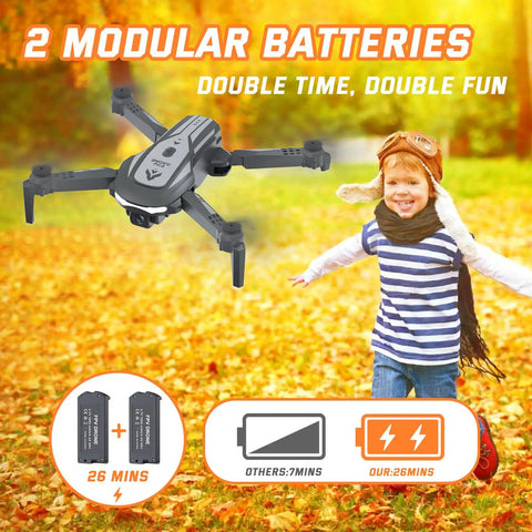 Mini Foldable FPV Drone With 1080P Camera For Kids And Adults flying outdoors with modular batteries and a child running nearby