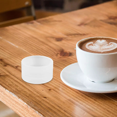 Compact Sturdy Coffee Pressing Adapter For Coffee Holder, Lightweight White PP Material, Pro Grade Precision Craftsmanship For Even Espresso Compression, No Fuss Portable Espresso Machine Accessory, Replacement Ring And Powder Holder Base beside latte