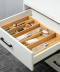 Expandable Bamboo Drawer Organizer For Kitchen Utensils And Flatware Adjustable Cutlery Tray And Knife Organizer Drawer Divider With Five Slots Fits Large Or Small Drawers Go To Kitchen Must Have Home Organizer in a white drawer with various items organized