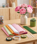 DIY Crepe Paper Flower Kit With Precut Sheets And Metal Wire For Realistic Bouquets Easy To Shape Flowers All In One Floral Stem Craft Set For Weddings And Scrapbooking with pink crepe paper blooms, wire, glue and tape