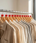 Red Sale Hanger Markers 200 Pcs High Visibility Coding Tags for wire and metal hangers displayed on wooden hangers in retail store