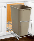 Heavy Duty Adjustable Cabinet Pullout Organizer with a smooth sliding rack holding a plastic trash bin under a kitchen sink.