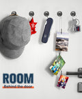 Heavy Duty Magnetic Hooks 80 Lb Capacity With Neodymium Grade 5 Magnets And Steel Construction, holding hat, photos, keys on door.