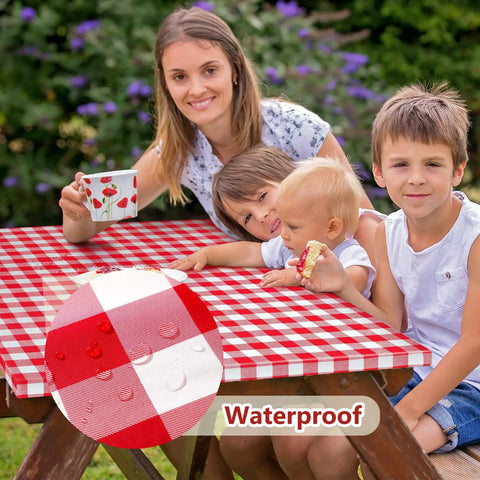 Family at picnic table with red waterproof picnic table cover with bench covers and bag red waterproof heavy duty vinyl 72 by 30 inches.