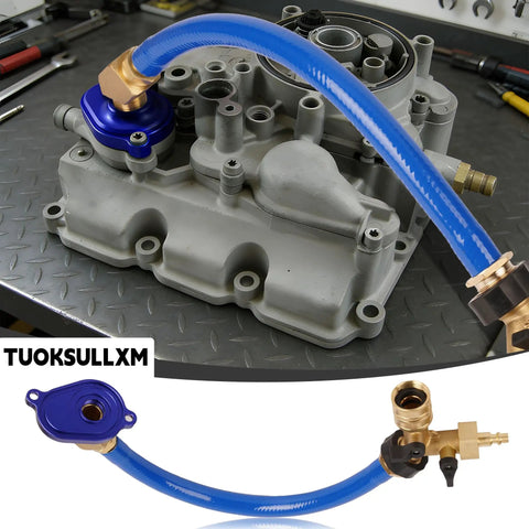 6.0L Oil Cooler Flush Kit With T Port And Anodized Aluminum Adapter for Ford 2003 to 2010 Diesel Engines on workbench