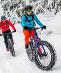 Two cyclists riding fat bikes with Heavy Duty 2 Pack Fat Bike Inner Tubes 24x4.0 to 4.5 AV32mm Schrader Valve on snow trail