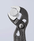 Cobra Water Pump Pliers 6 Inch With Self Locking Teeth And Pinch Guard For Safe Grip, holding a pipe securely.