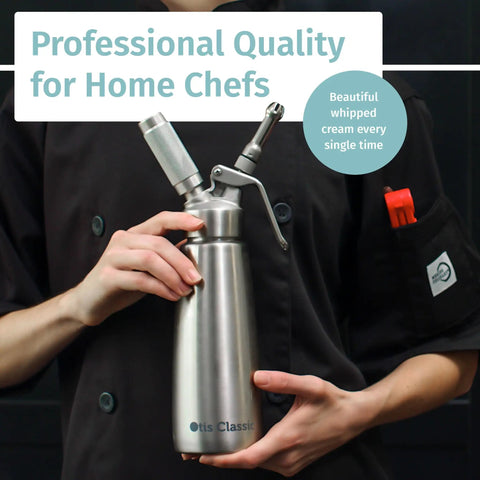 Person holding 304 Stainless Steel Whipped Cream Dispenser 500ml With 3 Decorating Nozzles, ideal for desserts and home chefs.