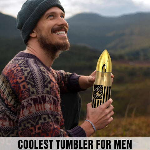Man holding 17oz Gold Stainless Steel Tumbler With American Flag Tool Design And I Fix Stuff And I Know Things Phrase outdoors