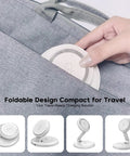 Hand placing MagSafe 3 In 1 Wireless Charging Station Dock in gray bag, showing foldable travel design, compact charger storage.