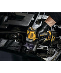 12V Max 3/8 Inch Cordless Impact Wrench Kit being used under a car hood for automotive repairs.