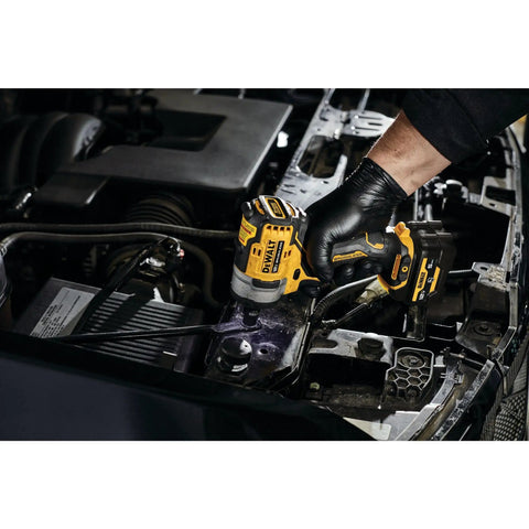 12V Max 3/8 Inch Cordless Impact Wrench Kit being used under a car hood for automotive repairs.