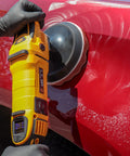 Pro Level Car Buffing And Polishing Kit With Eight Inch Waffle Foam Pads being used on red car surface for glossy finish.