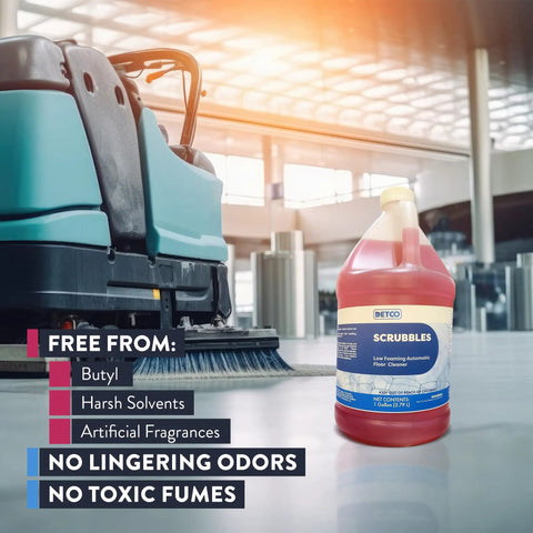 Heavy Duty Low Foam Auto Floor Cleaner, Straight Up Pro Grade Concentrate in front of an auto scrubber, one gallon jug.