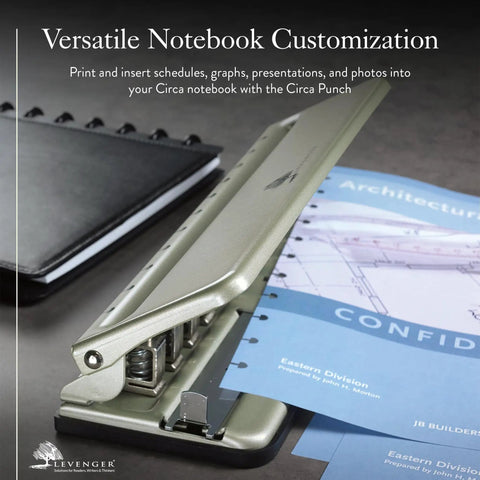Universal Desk Discbound Hole Punch punching pages, perfect for disc notebooks in home office, school, or business setting.