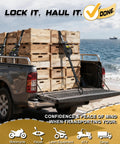 Pickup truck with crates secured by heavy duty self retracting ratchet straps 10 feet 1500 lb break strength 2 pack