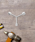 Heavy Duty Y Shape Three Prong Socket Wrench For Pool Table Rail Fix and Felt Cloth Swap on wooden surface with tools.