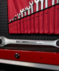 Raised Panel 16-Piece Combination Wrench Set SAE Standard 1/4 In To 1-1/4 In, displayed on a red tool bench with a wrench rack.