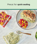 Pack Of 30 Pint-Sized Precut Vacuum Seal Bags, BPA Free Multilayer Construction For Food Preservation shown with fresh produce