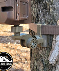Universal Trail Camera Mount With Standard Camera Thread And 360 Degree Leveling Plus 180 Degree Tilt No Sweat Strap Rig For Tough Hunts And Wildlife Photography Outdoors Gear mounted on a tree.