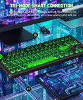 TKL Wireless Mechanical Gaming Keyboard Black Built Different With Massive 10000Mah Battery showcasing tri-mode smart connection with glowing keys.