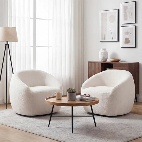 Living room setup with two White Boucle Swivel Chair With 360 Degree Base, Oversized Round Barrel Accent Chair For Living Room, Super Cozy And Extra Comfy Ergonomic Design, Wide Seat For Back Support And Lounge Vibes around a wooden coffee table, soft natural light from large window in background