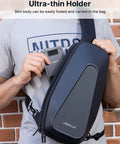 Person carrying foldable aluminum phone stand in slim black case